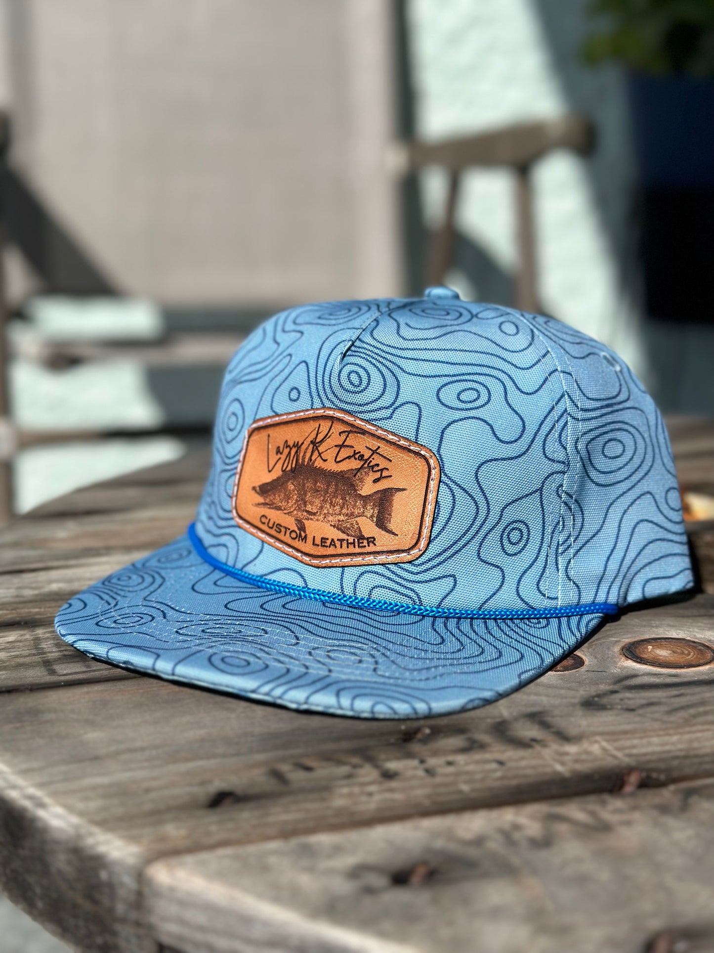 “Lazy K Exotics” hog fish logo hat (blue topography)