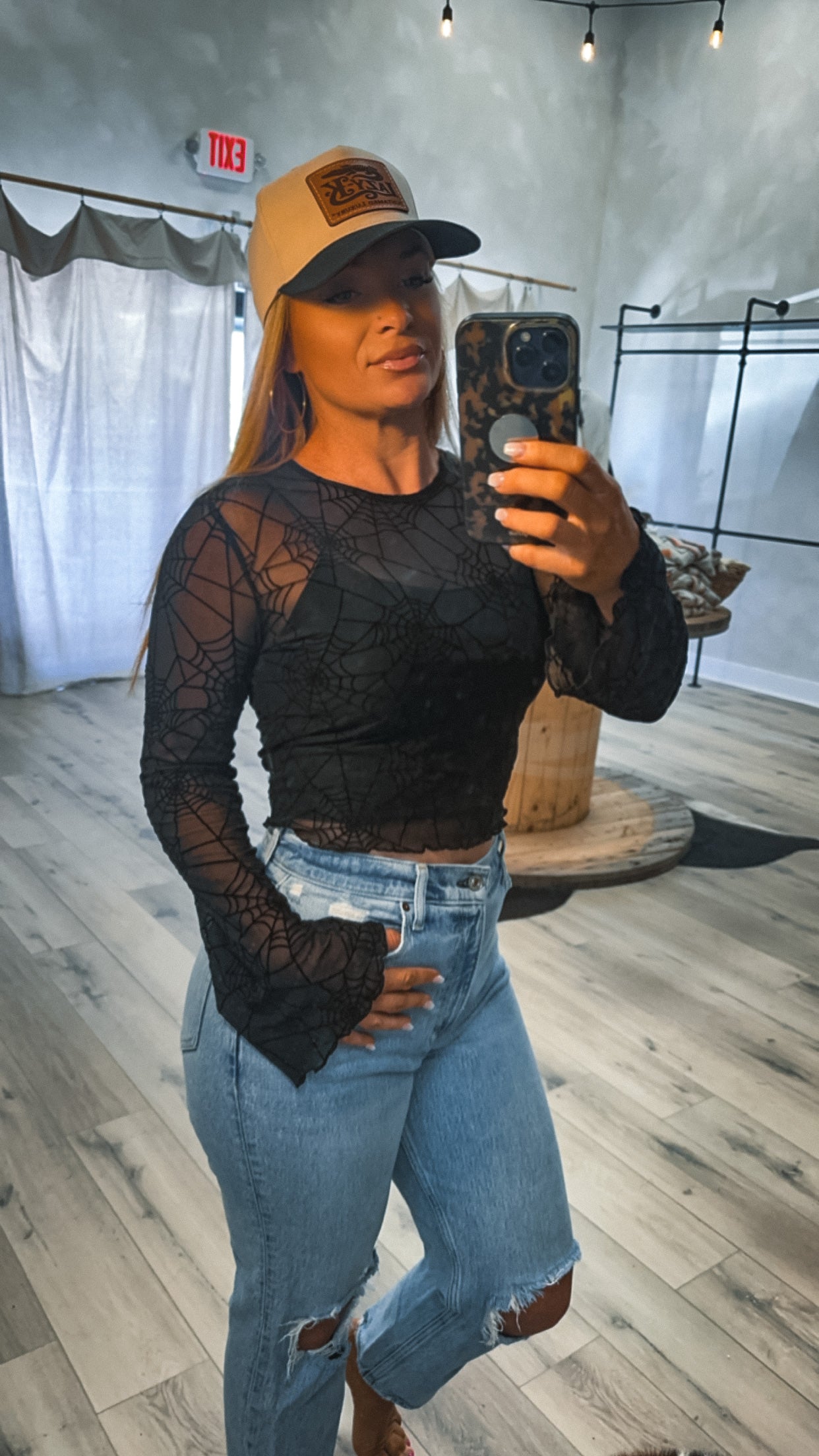 The “Sabrina” sheer ruffle top