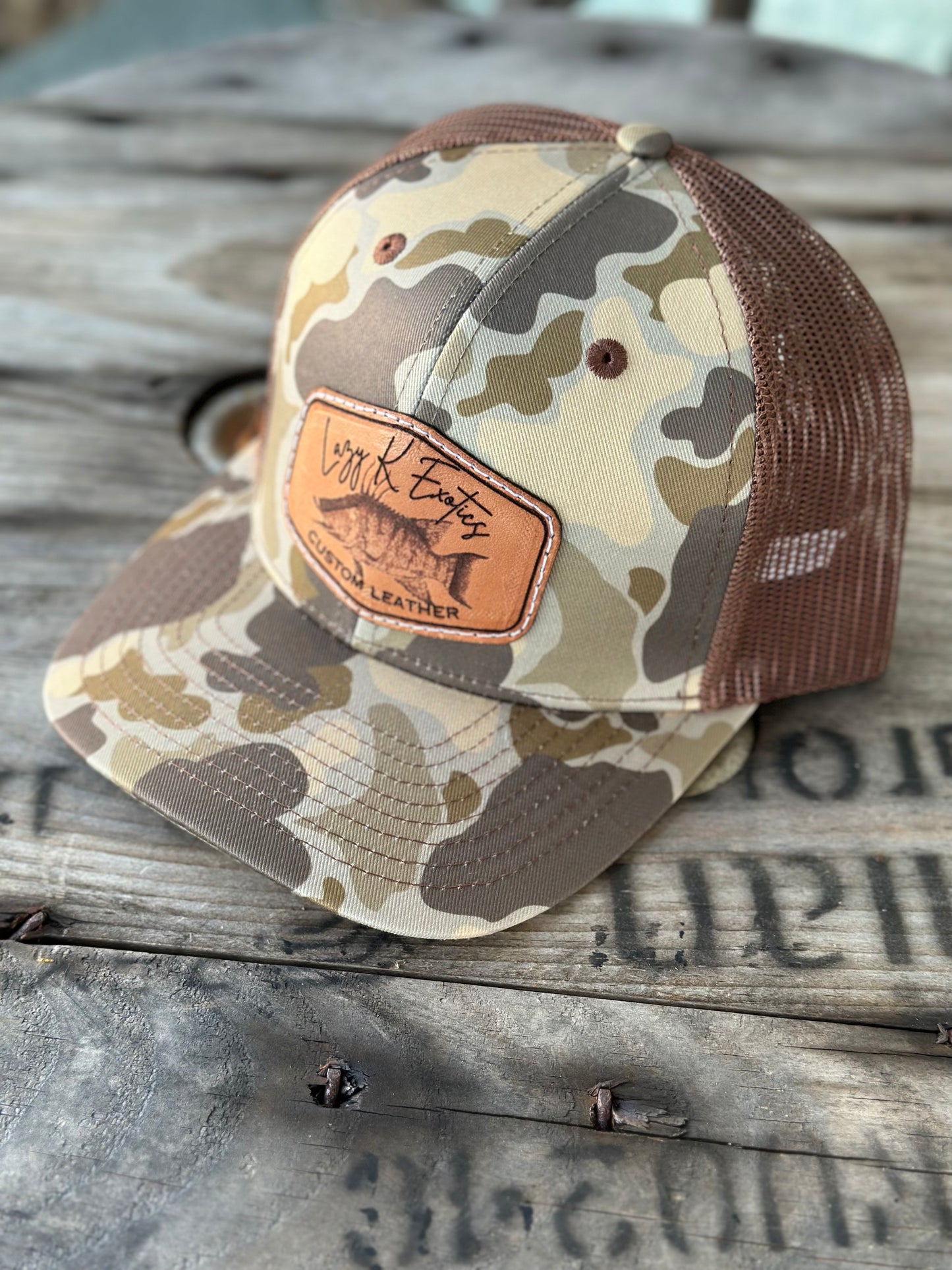 “Lazy K Exotics” hog fish hat (duck camo/ brown)