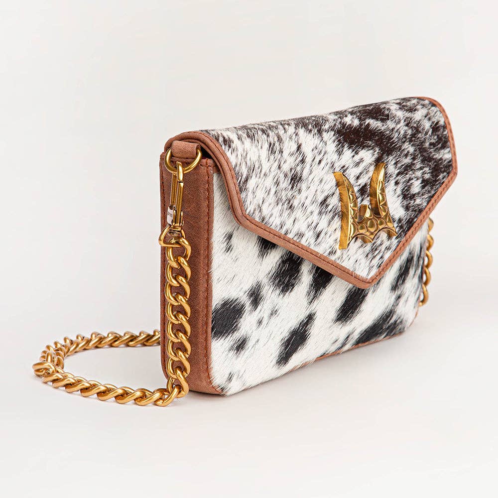The LW speedster mini chain bag in brown and white cowhide