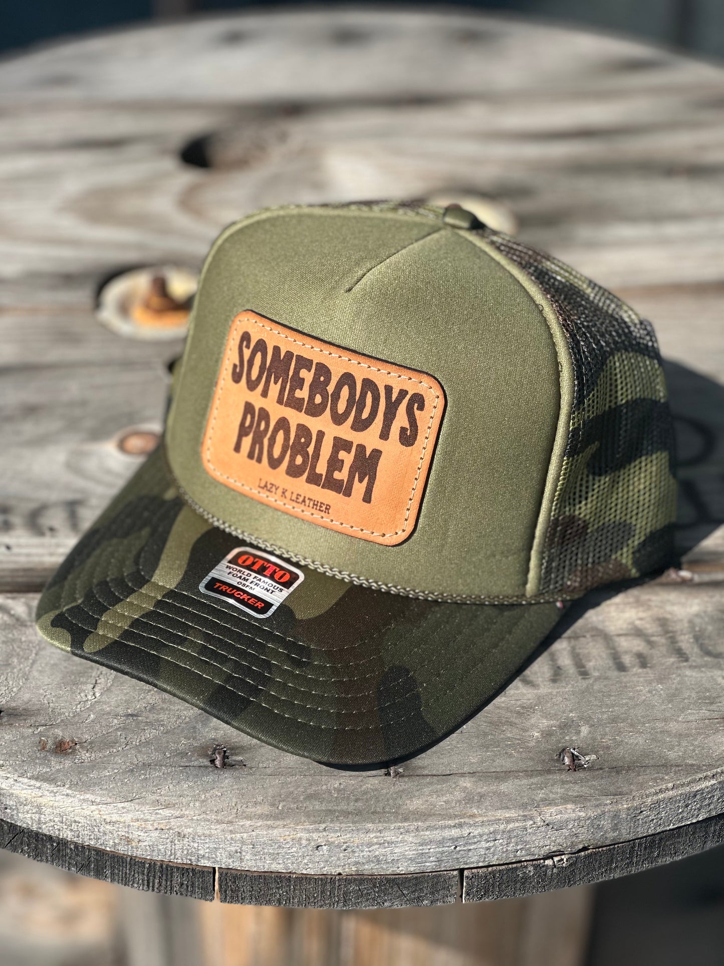 Somebodys problem trucker (plain logo)