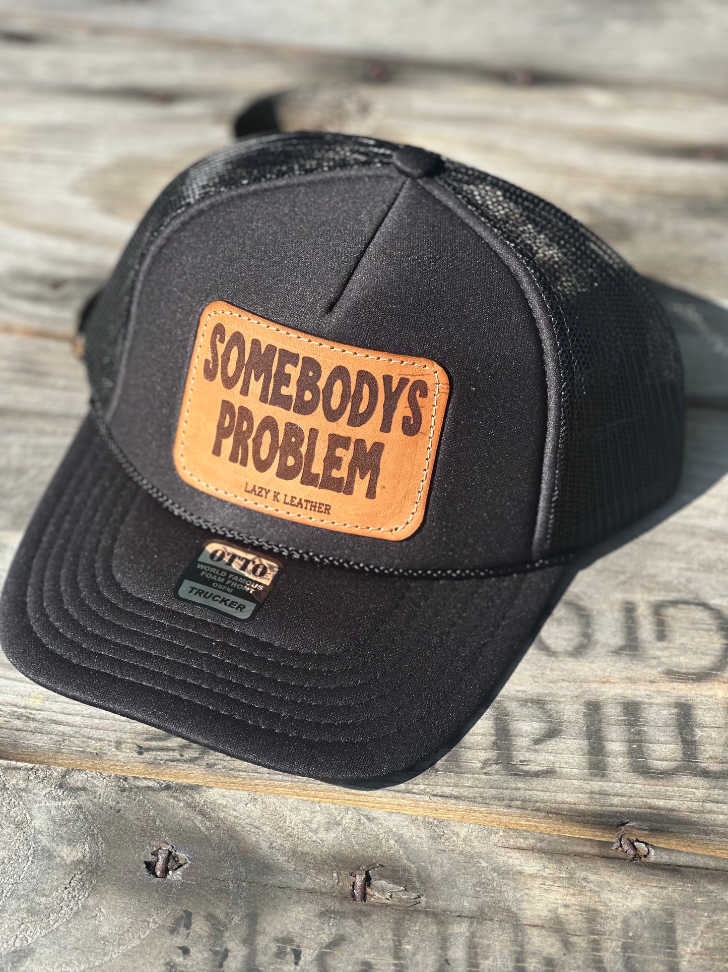 Somebodys problem trucker (plain logo)