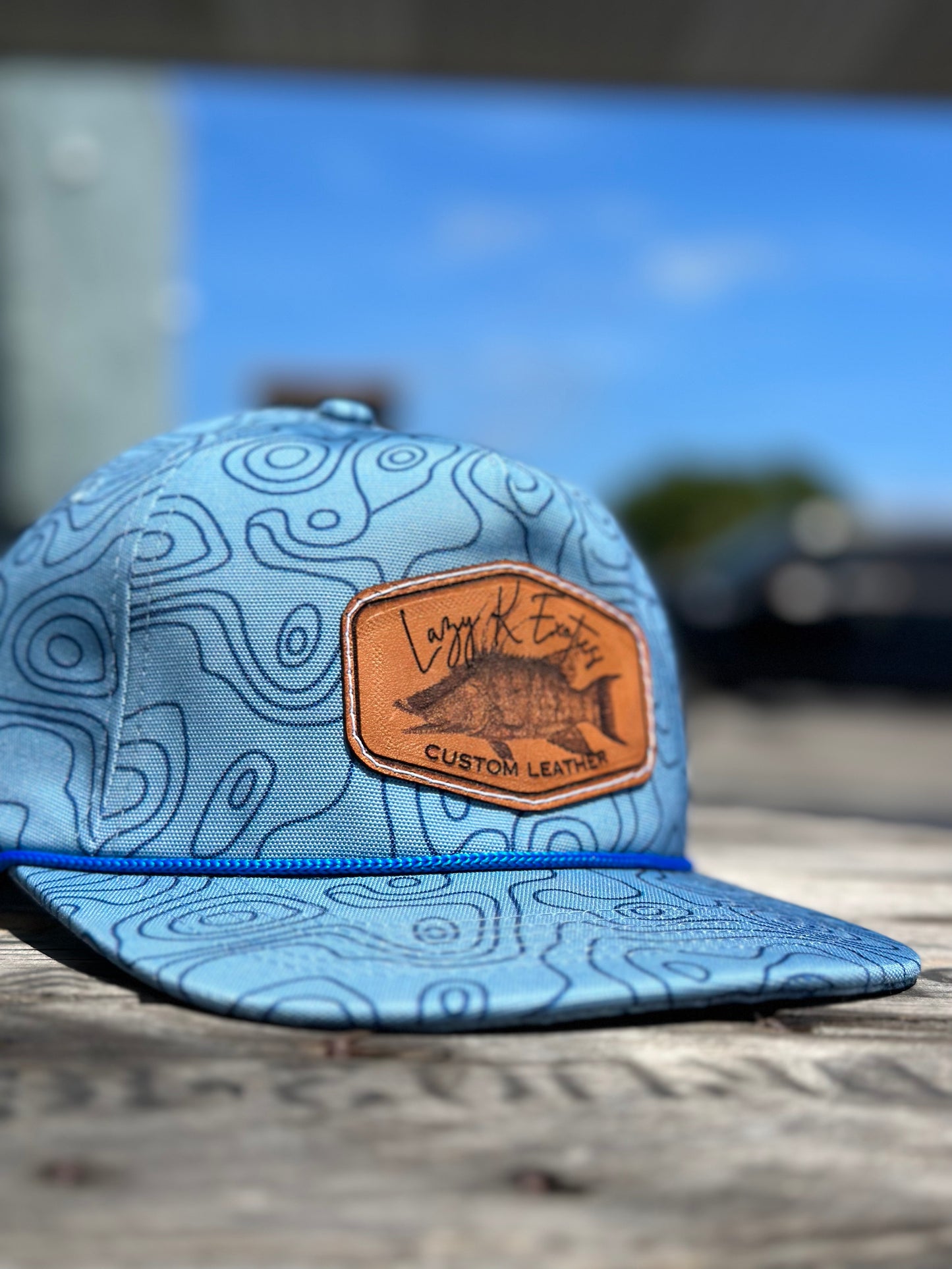 “Lazy K Exotics” hog fish logo hat (blue topography)