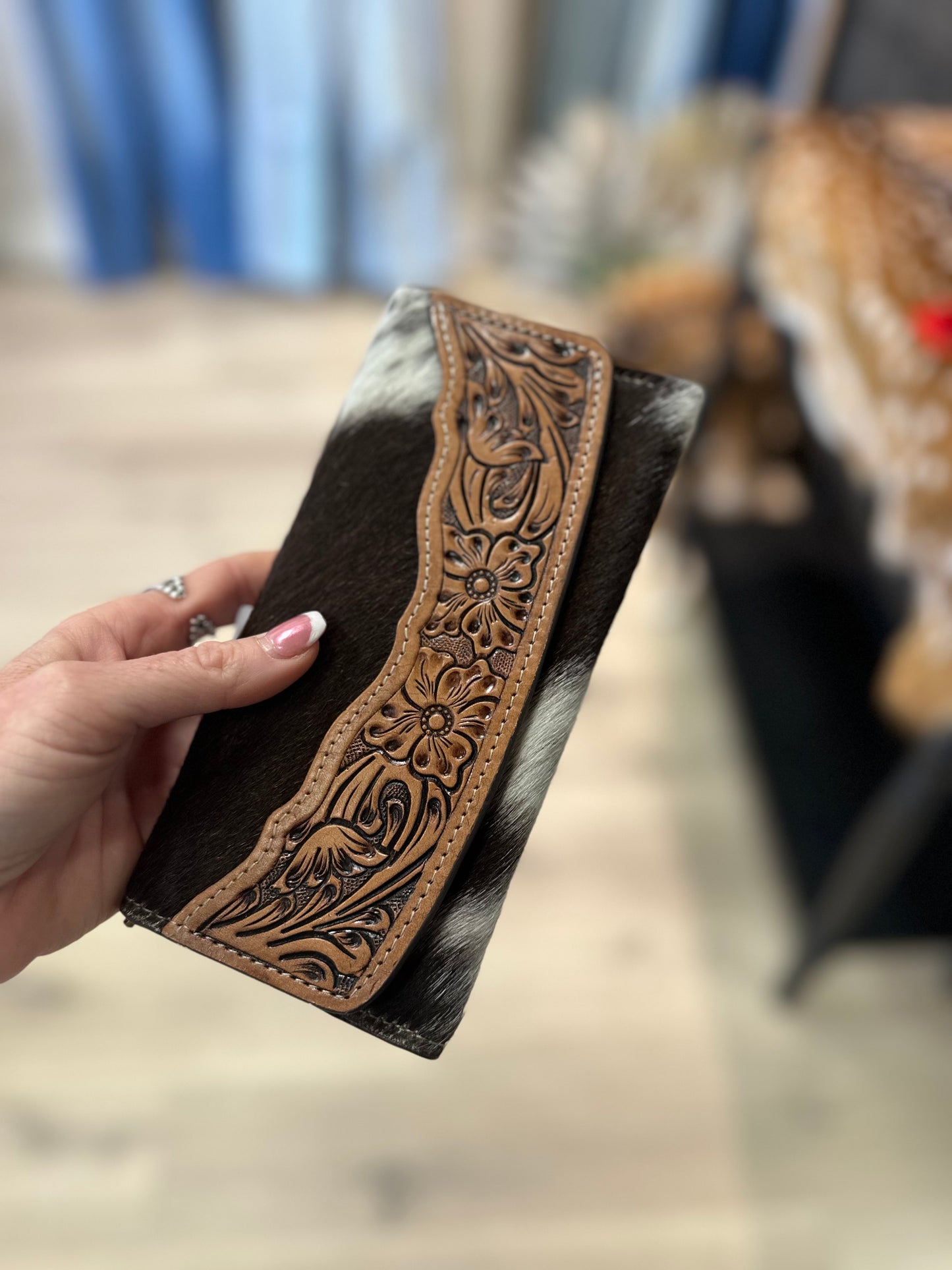 Tooled hair on wallet