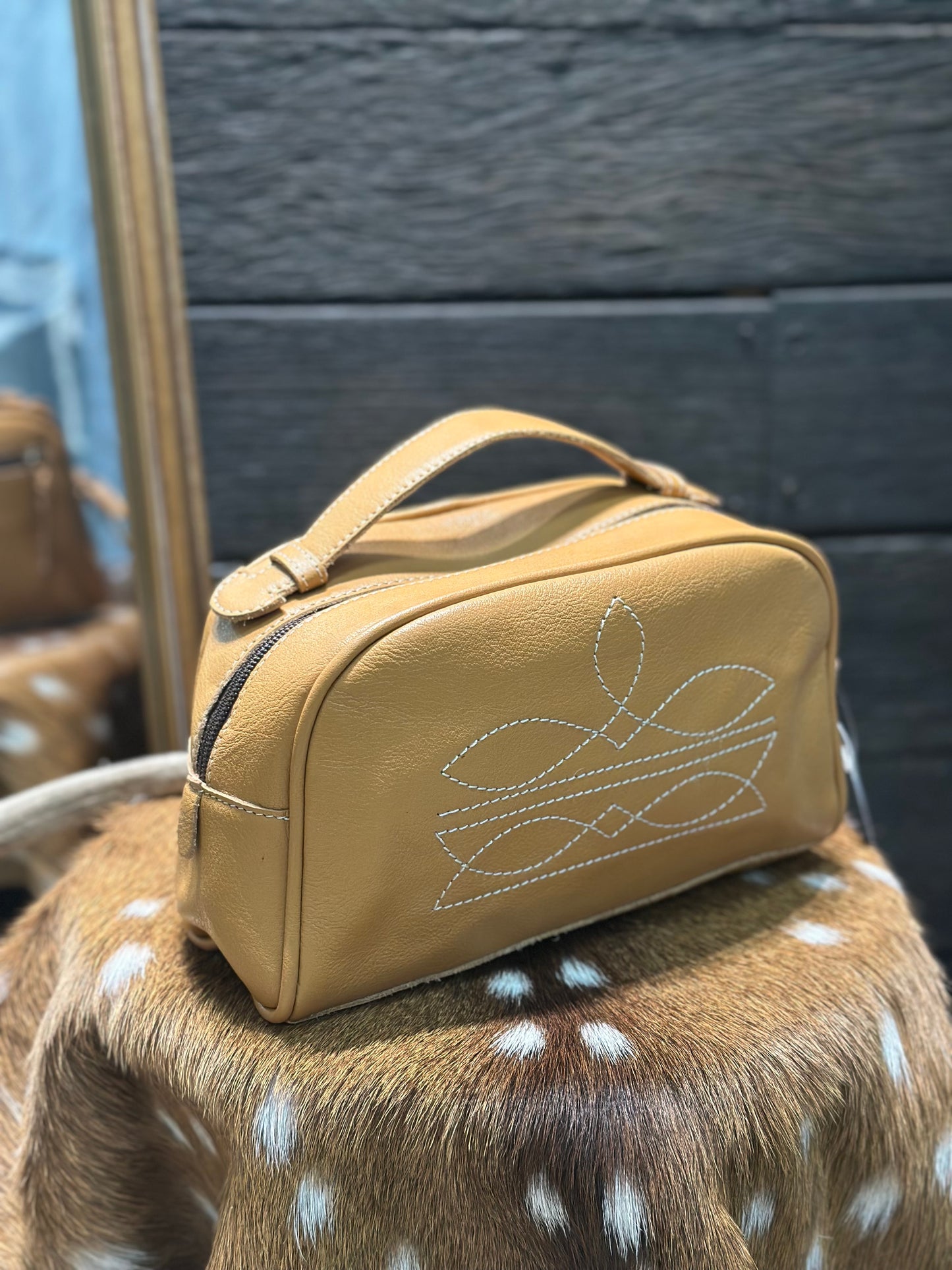 Boot stitch toiletry bag