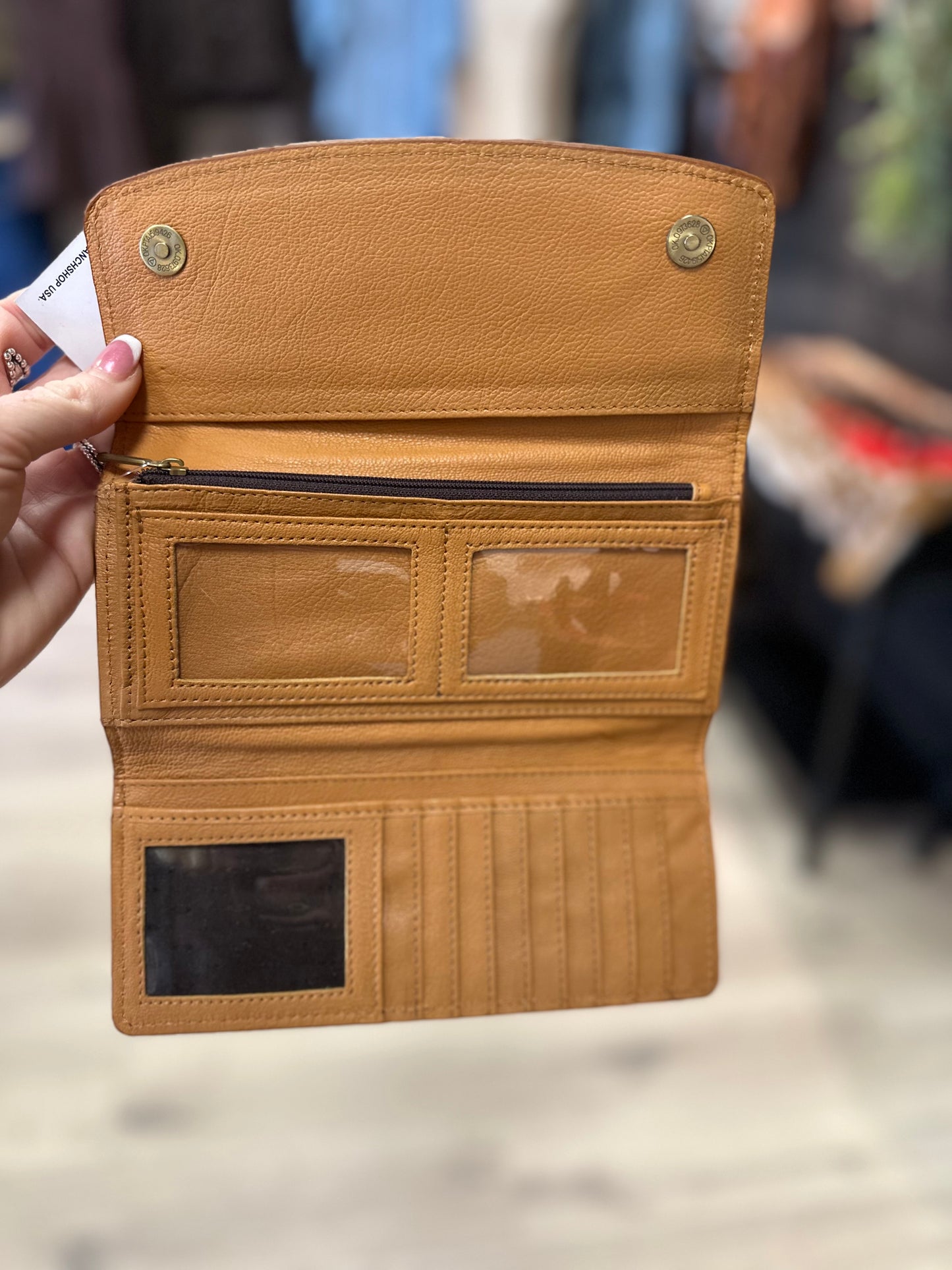 Tooled hair on wallet