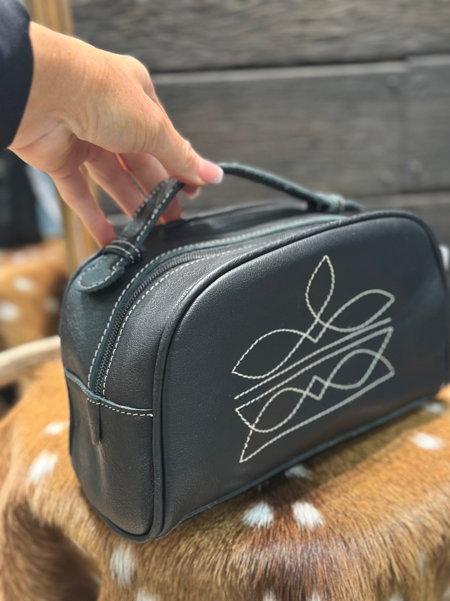Boot stitch toiletry bag