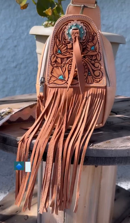 Tan tooled sling bag